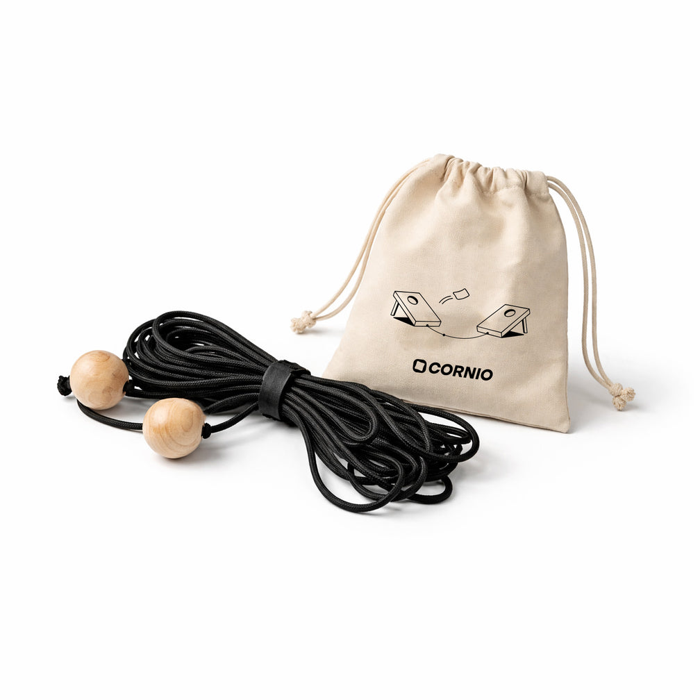 Cornhole measure string made by cornio for perfect setting uo cornholegames everytime with a stringbag and cord with wood balls in a white backgroud. 
